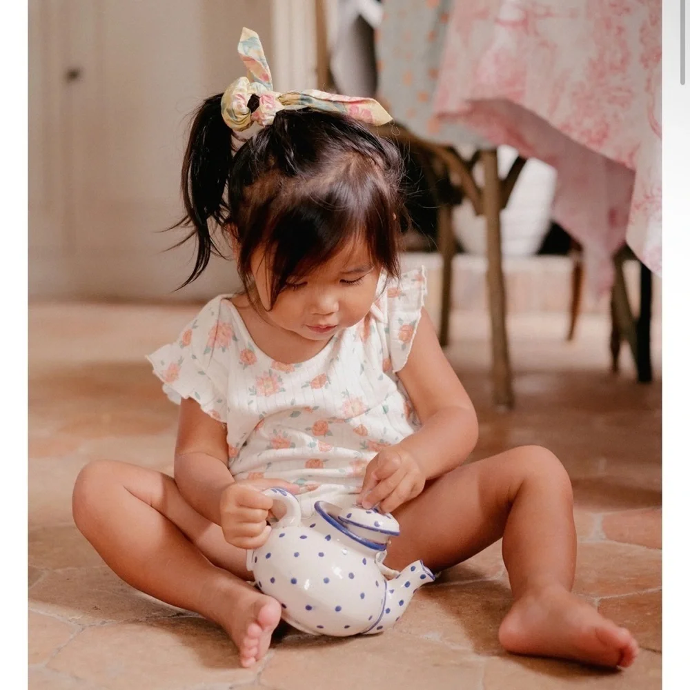 Floral Baby Onesie by louise misha